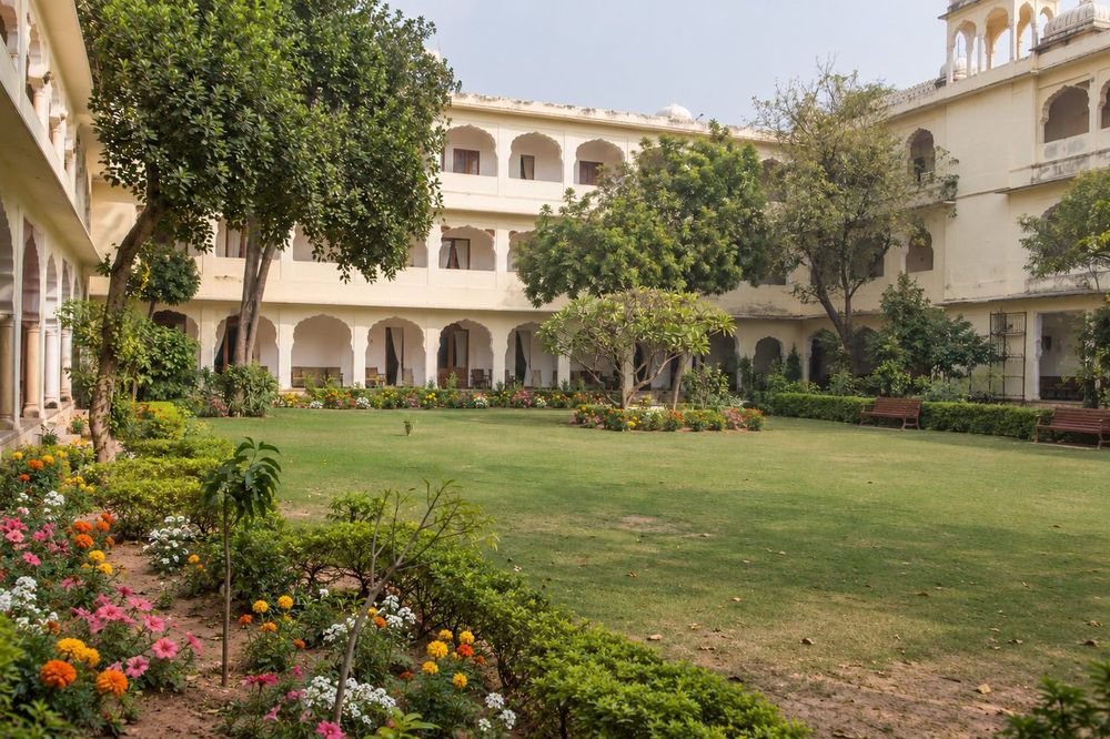 Heritage courtyard garden with arcaded walls