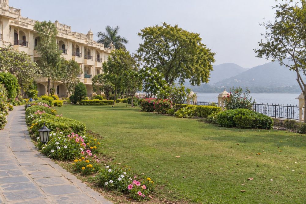 Lakeside resort grounds with lawn and shaded walk