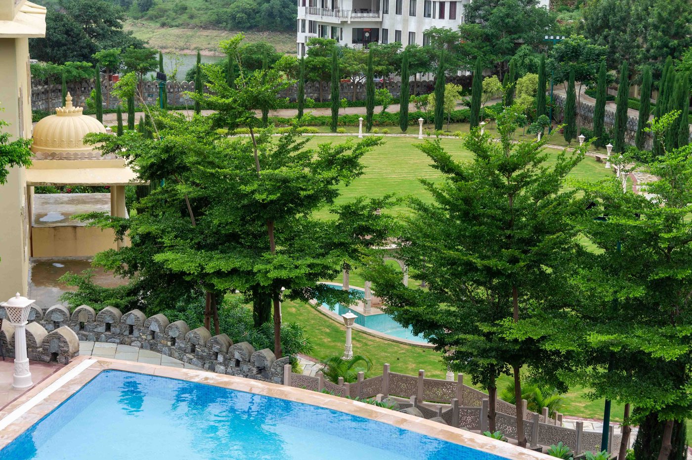 Nature’s Touch resort landscaping at Kumbhalgarh — lawns, hedging and flowering borders